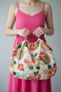 Bolso de aros blanco y dorado