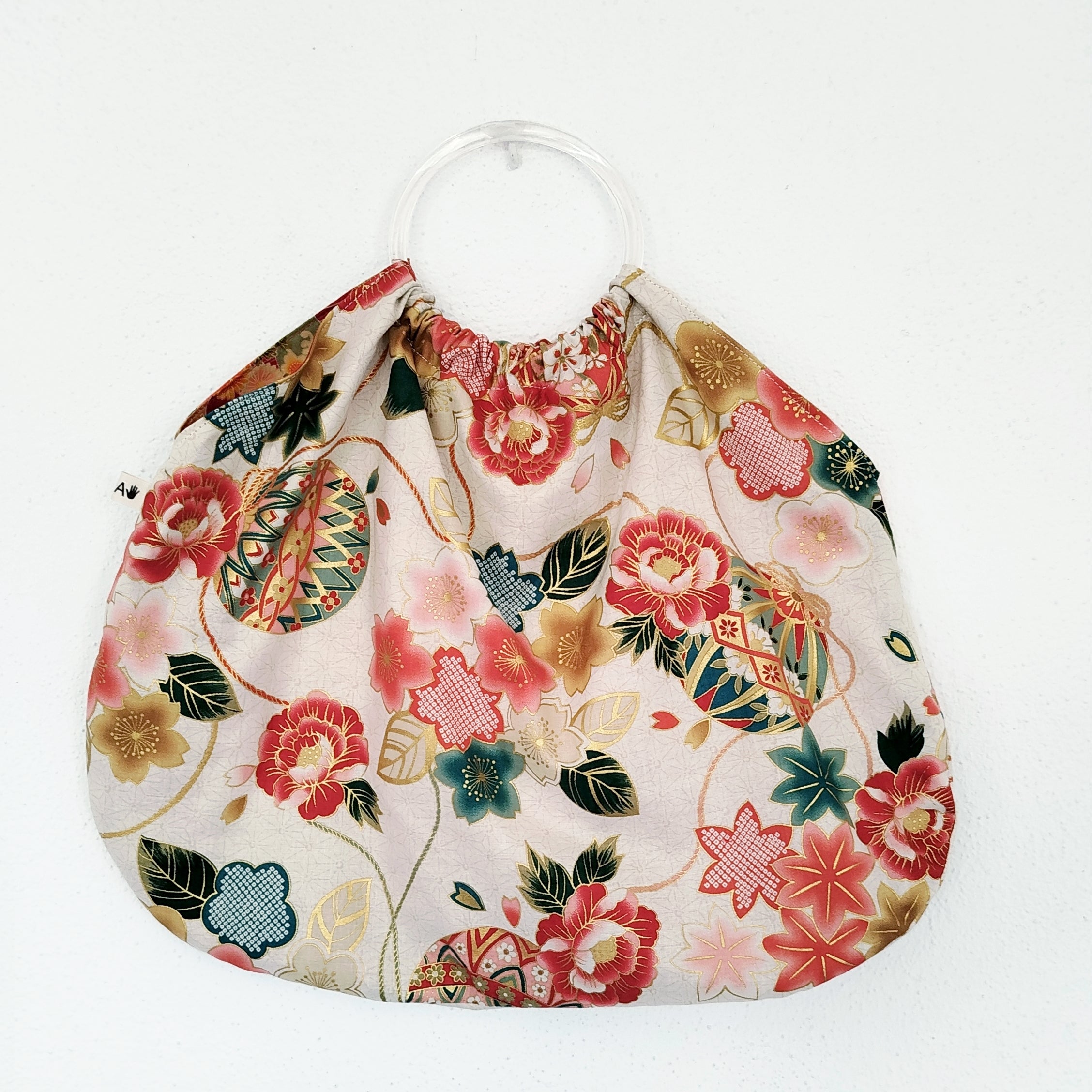 Bolso de aros blanco y dorado