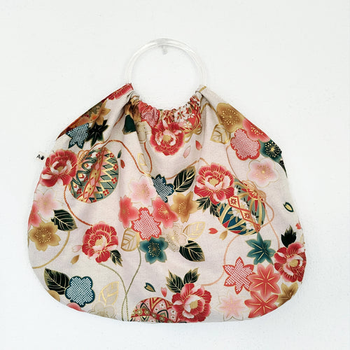 Bolso de aros blanco y dorado