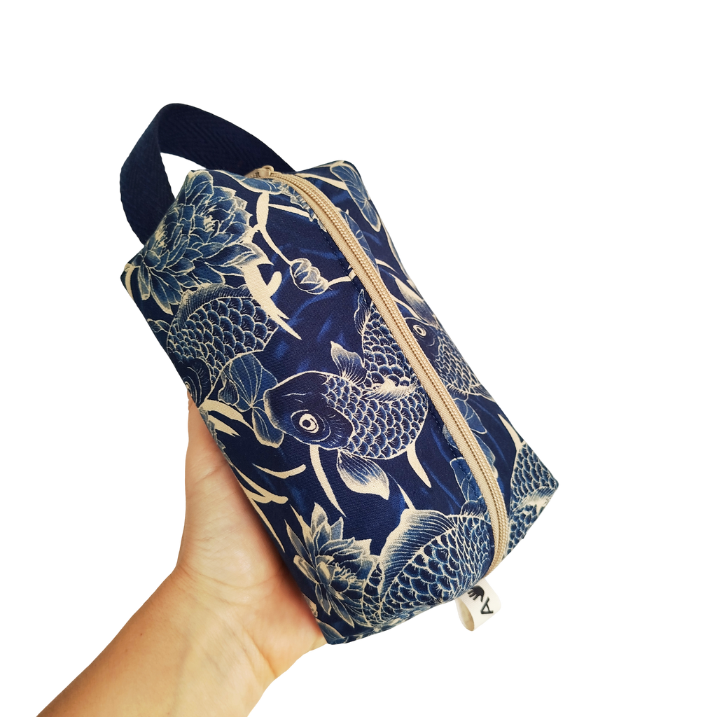 Neceser azul y beige carpas