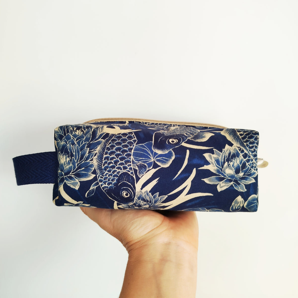 Neceser azul y beige carpas