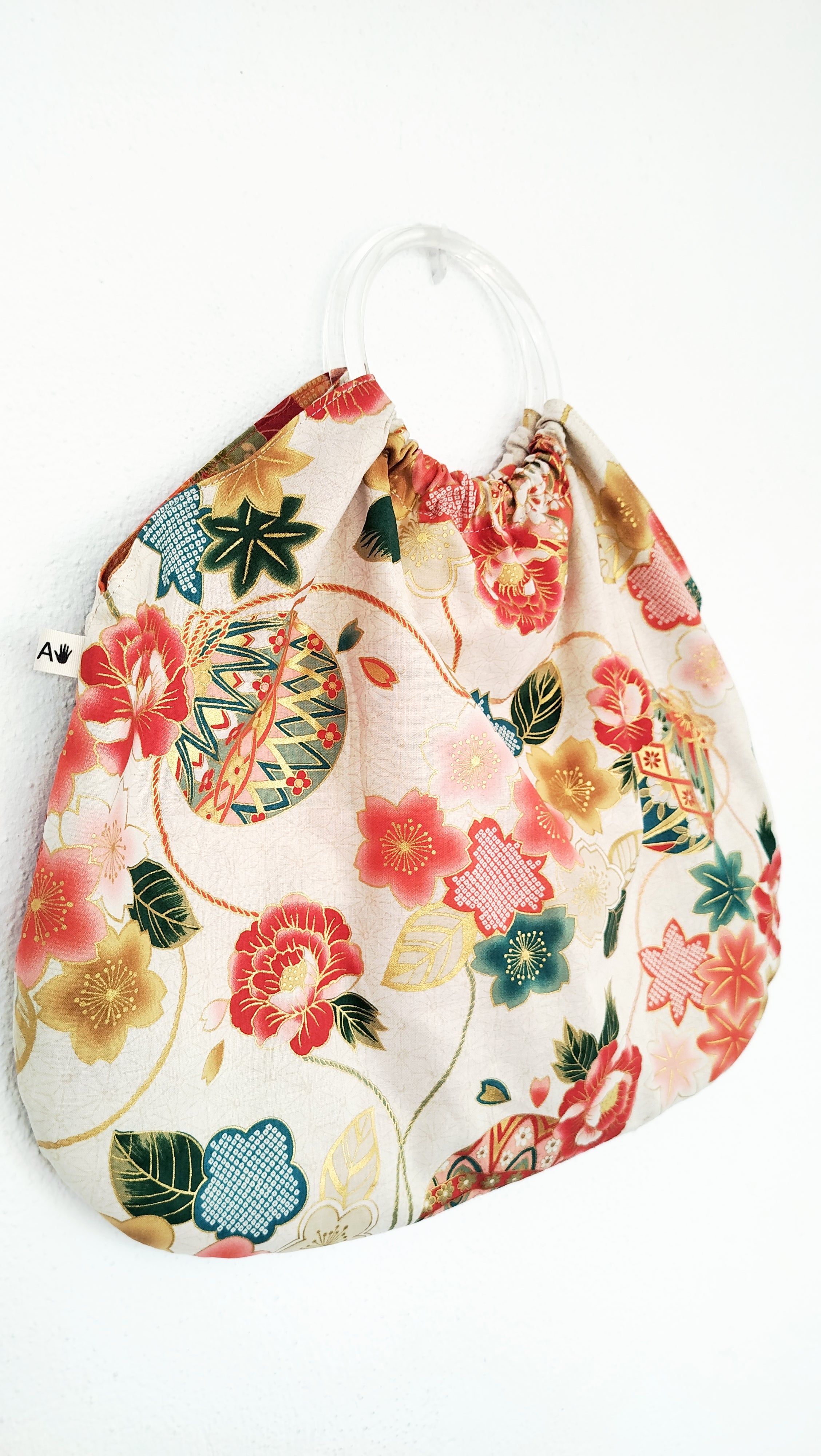 Bolso de aros blanco y dorado